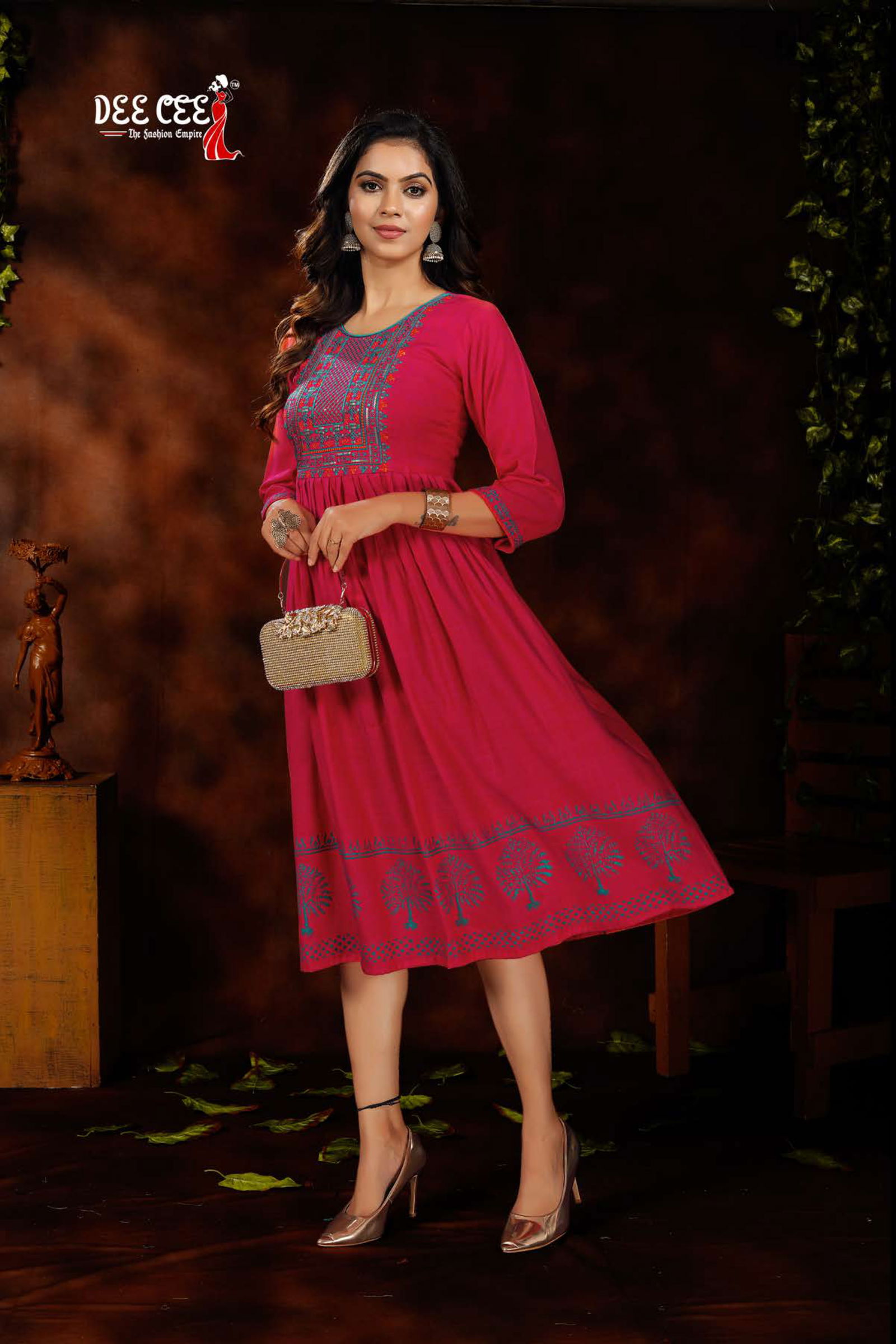 Dee Cee Orange Rayon Fancy Wear Designer Latest Kurtis Collection